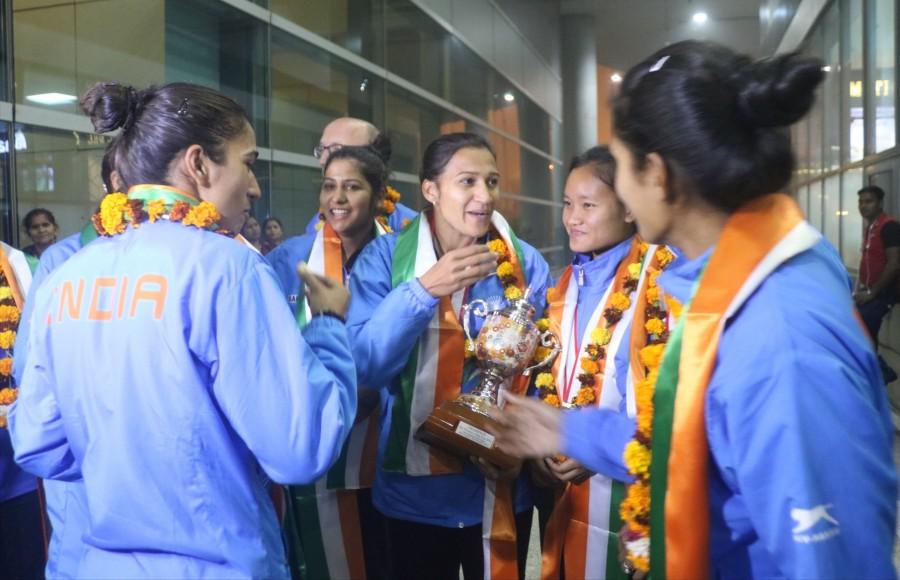 India edged past China 5-4 via shootouts to win the womens Asia Cup hockey title here on Sunday. Indian women's hockey team,women's hockey team,T3 Airport,Indian women hockey team