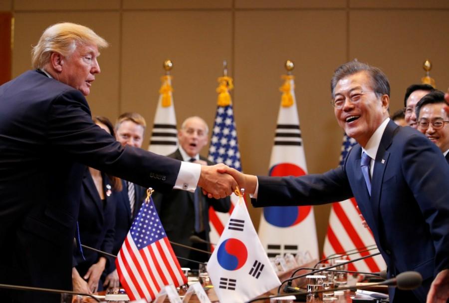 U.S. President Donald Trump and South Korea’s President Moon Jae-in shake hands during a meeting at South Korea’s presidential Blue House in Seoul, South Korea, November 7, 2017. Donald Trump,US President Donald Trump,Donald Trump president,Donald Trump in Asia,Donald Trump Asia trip,Donald Trump Asia visit,Donald Trump Asia tour