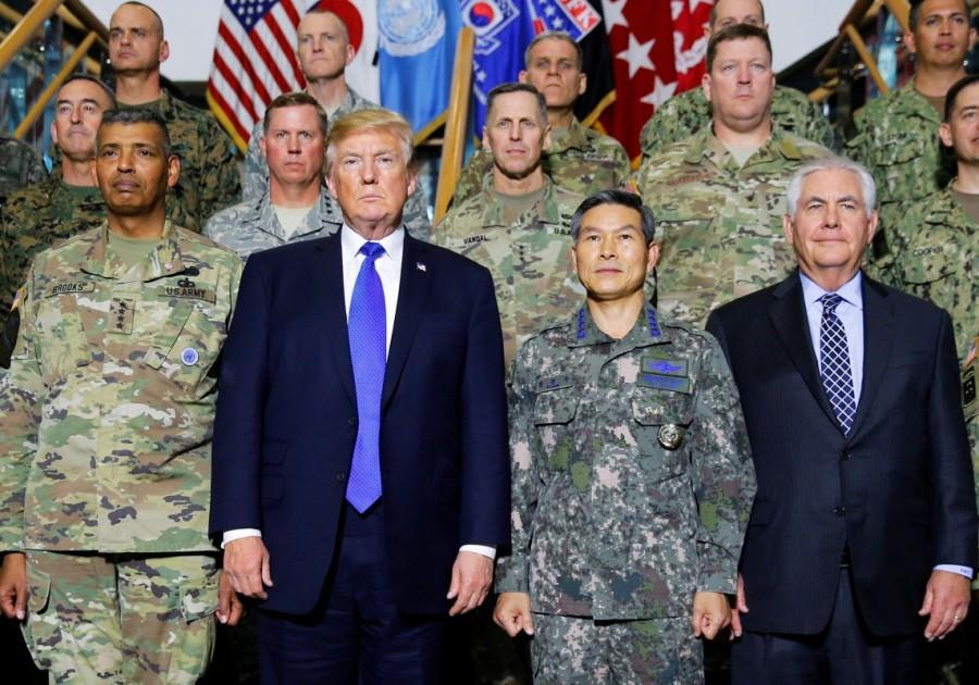 U.S. President Donald Trump poses for a photo with military commanders at the U.S. Eighth Army Operation Command Center at U.S. military installation Camp Humphreys in Pyeongtaek, South Korea, November 7, 2017. Donald Trump,US President Donald Trump,Donald Trump president,Donald Trump in Asia,Donald Trump Asia trip,Donald Trump Asia visit,Donald Trump Asia tour