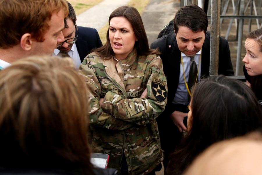In a borrowed U.S. Army jacket to keep warm, White House Press Secretary Sarah Huckabee Sanders updates reporters on President Trump's failed attempt, preempted by weather, to visit Observation Post Ouellette along the Demilitarized Zone. Fog forces,President Trump,Trump,Donald Trump