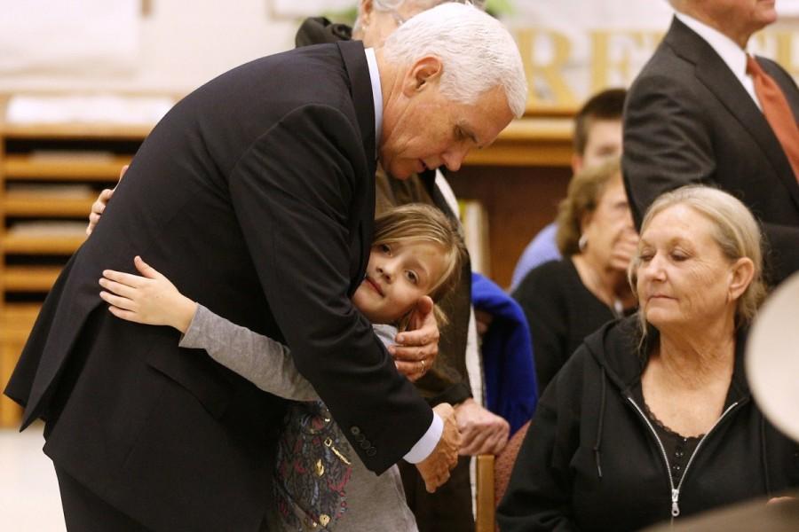 Vice President Mike Pence hugs Evelyn Holcombe at Floresville high school in Floresville, Texas. Holcombe was in the church during the shooting. Mike Pence,Vice President Mike Pence,Mike Pence pays tribute in Texas