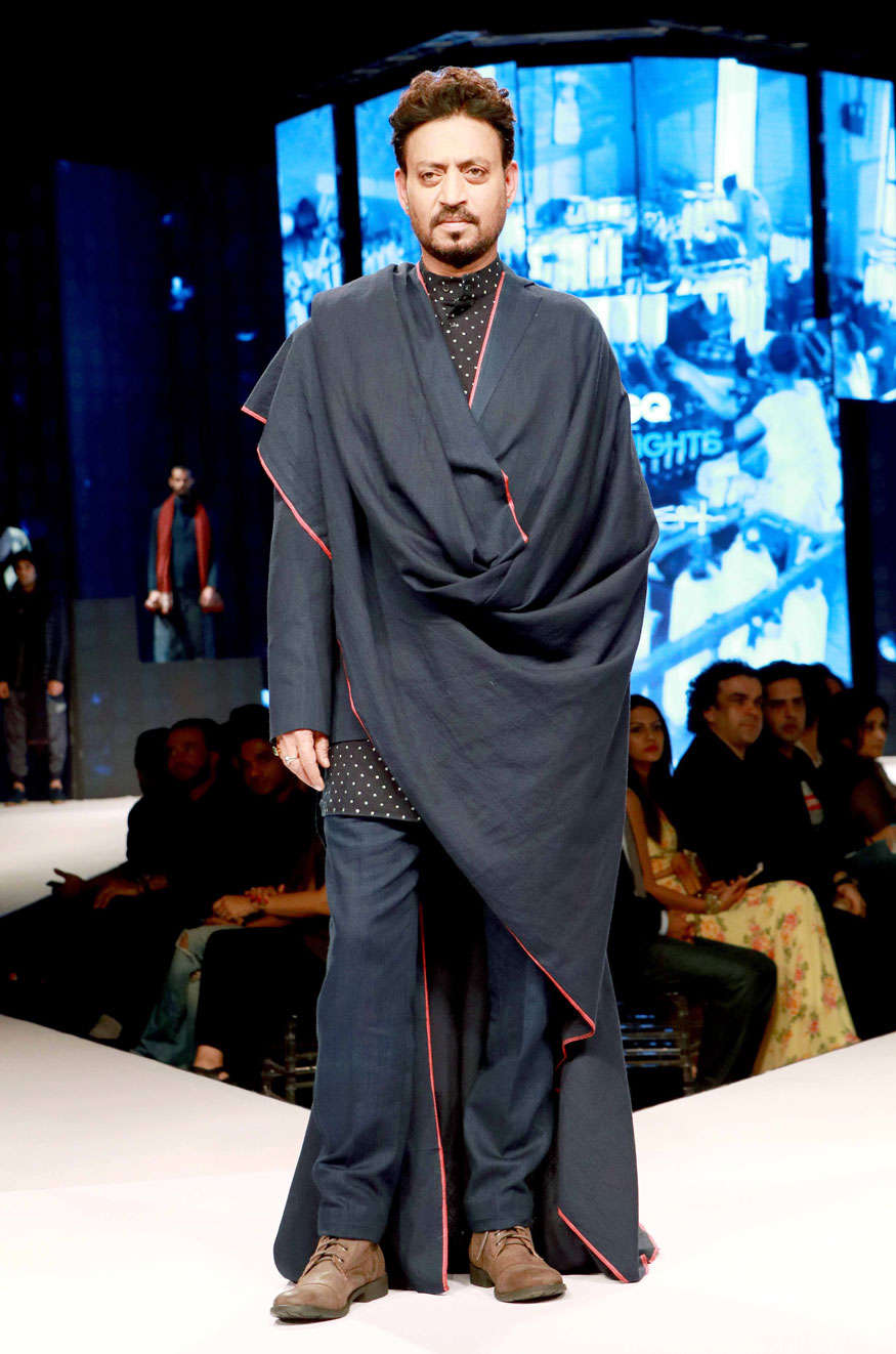 This year Irrfan walked for Rajesh Pratap Singh who is also known for most unique outfits for both male and female. These two extremely talented men came together and have brought to us the most distinctive way of dressing. Draped in navy blue coupled with perfect patterns and quirky touches, Irrfan surely does make his style look effortless. Qarib Qarib Singlle,Irrfan Khan,Irrfan Khan at GQ Fashion Night 2017,GQ Fashion Night 2017,Irrfan Khan walks the ramp,Irrfan Khan ramp walk