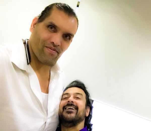 "Guess who I 'bumped' into at Amritsar airport.... This is what happens when the Great Khali takes a selfie with you! Lovely guy," Sami captioned the image. Adnan Sami,singer Adnan Sami,Great Khali,Adnan Sami meets Great Khali,World Wrestling Entertainment,superstar The Great Khali,The Great Khali
