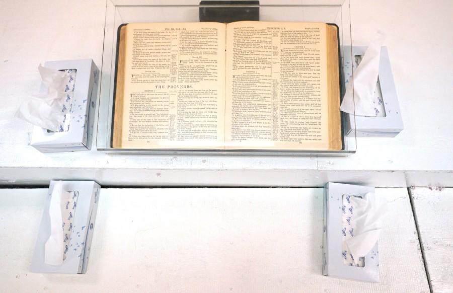A Bible open to the book of Proverbs is seen at the First Baptist Church of Sutherland Springs where 26 people were killed one week ago, as the church opens to the public as a memorial to those killed, in Sutherland Springs, Texas, U.S. November 12, 2017. Texas church,Texas church reopens,Sutherland Springs,First Baptist Church