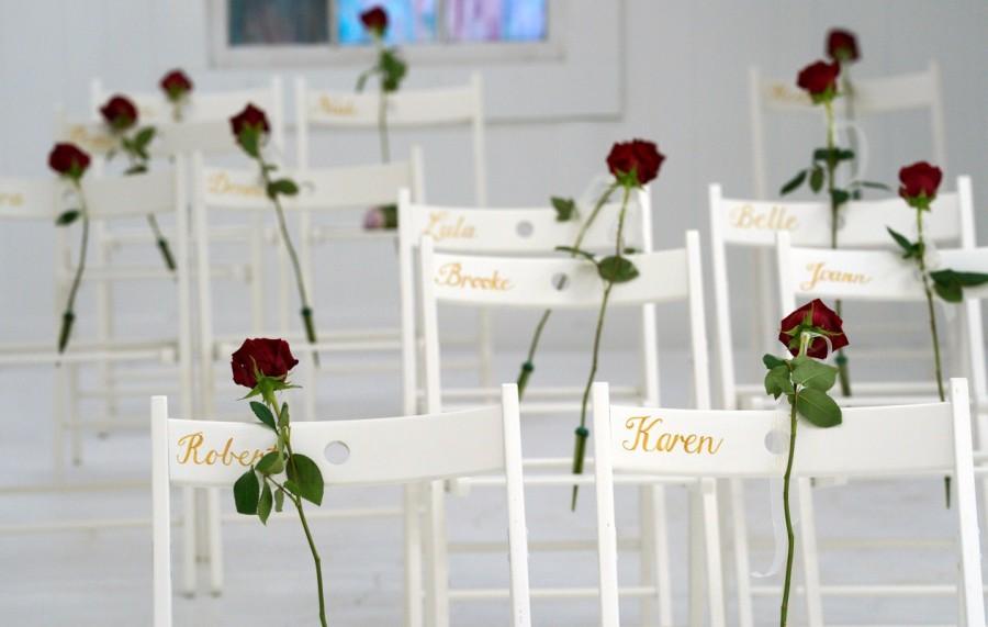 Chairs and roses show where people were found dead at the First Baptist Church of Sutherland Springs. Texas church,Texas church reopens,Sutherland Springs,First Baptist Church