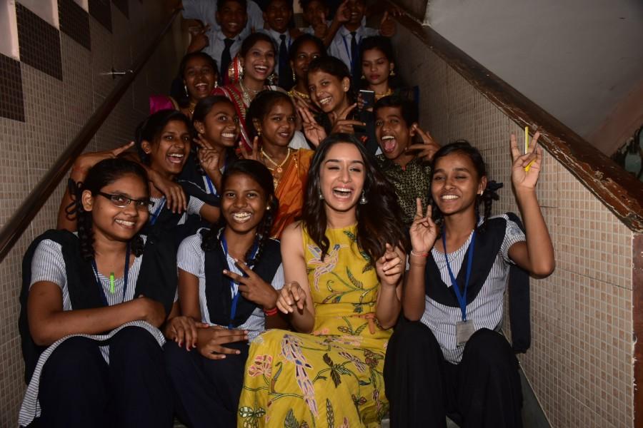 Shraddha who is very fond of kids decided to surprise the kids of a Mumbai Government school by visiting them and spending quality time, indulging in some origami as well as chit chatting with them. Shraddha Kapoor,Shraddha Kapoor celebrates Children's Day,Children's Day,Children's Day celebrations,actress Shraddha Kapoor