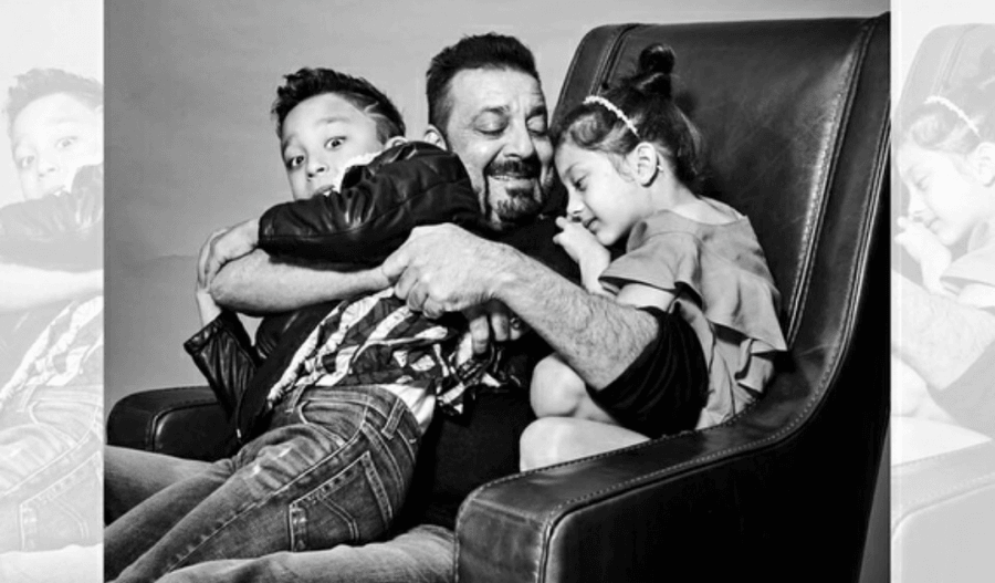 Sanjay Dutt who time and again gives us parenting goals has shared a picture with his kids ahead of Children's day. The monochrome picture showcases the doting dad posing for a picture-perfect moment with his adorable twins Iqra and Shahraan. Sanjay Dutt,Sanjay Dutt kids,Shahraan and Iqra Dutt,Shahraan,Iqra Dutt,Shahraan Dutt,Superstar Sanjay Dutt