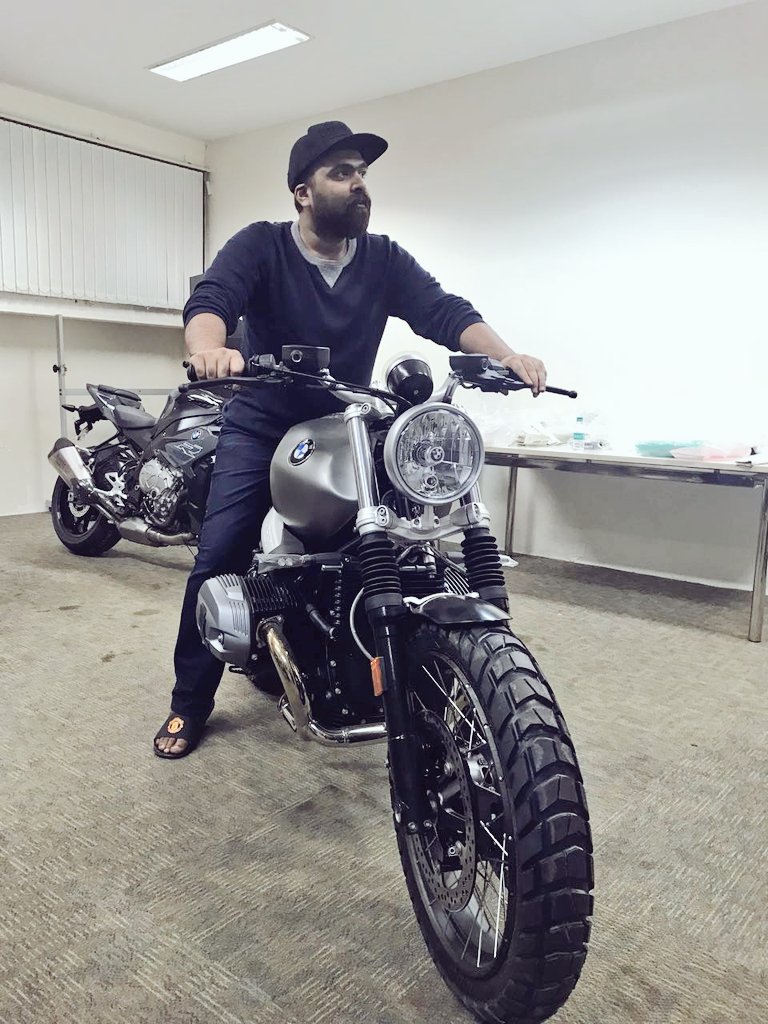 Brand new stills of Little Super Star Simbu. Simbu,actor Simbu,Simbu with BMW Motor Ad,BMW Motor Ad,Simbu at BMW,Simbu with his new BMW Bike,Simbu with BMW Bike