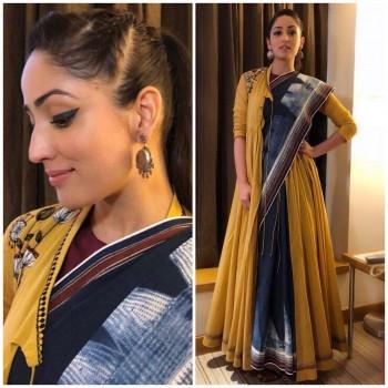 Yami Gautam is one actress who is fearless of experimenting with new looks and this time she is seen in a never before look as she dresses up in a saree. Yami Gautam mesmerized us, wearing an Anju Modi creation styled by Tanya Ghavri. With makeup by Shraddha Naik, Yami looked very pretty in the minimal makeup, focusing on the eyes. With a simple yet trendy hairdo by Ayesha Devitre, Yami Gautam looks amazingly in the crisp ponytail.