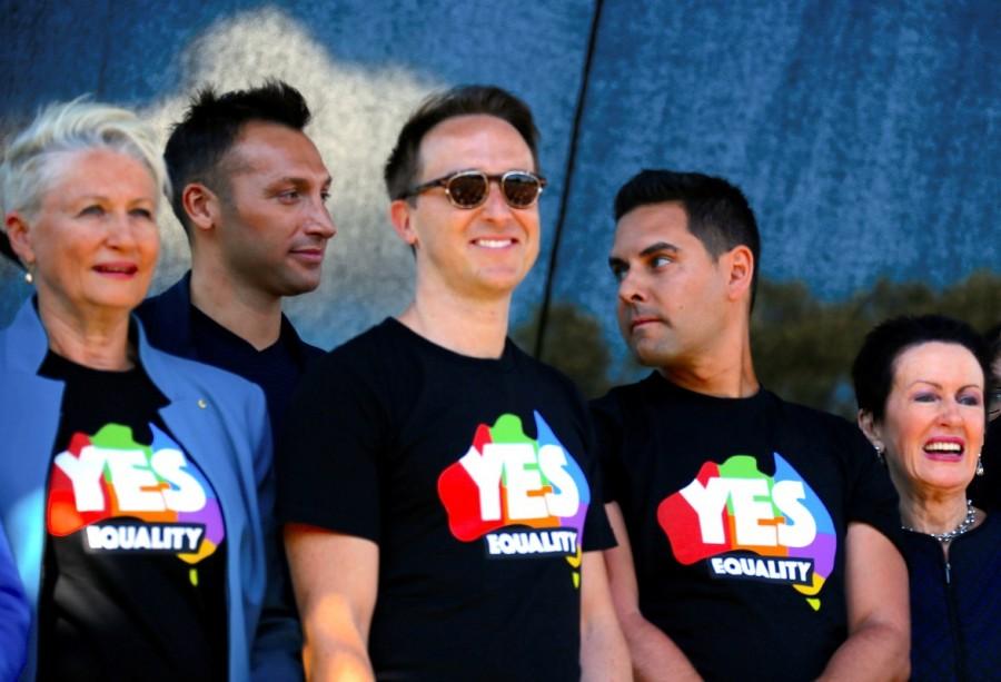 Ian Thorpe, former Olympic gold medalist swimmer, stands with other supporters at a rally in central Sydney. Same-sex marriage,same-sex marriage legalised,same-sex marriage Australia,Australians vote for same-sex marriage,vote for same-sex marriage