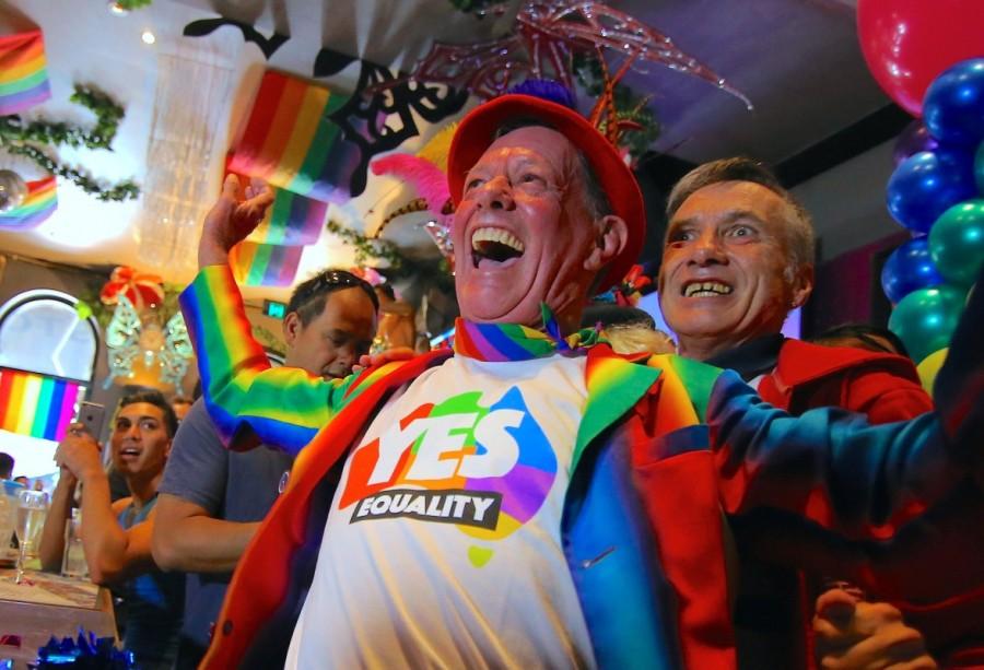 Supporters celebrate at a pub located on Sydney's Oxford street. Same-sex marriage,same-sex marriage legalised,same-sex marriage Australia,Australians vote for same-sex marriage,vote for same-sex marriage