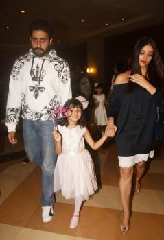 Abhishek Bachchan and Aishwarya Rai Bachchan attend their daughter Aaradhya.