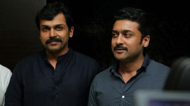 Karthi, Suriya spotted at Theeran Adhigaram Ondru Premiere Show.