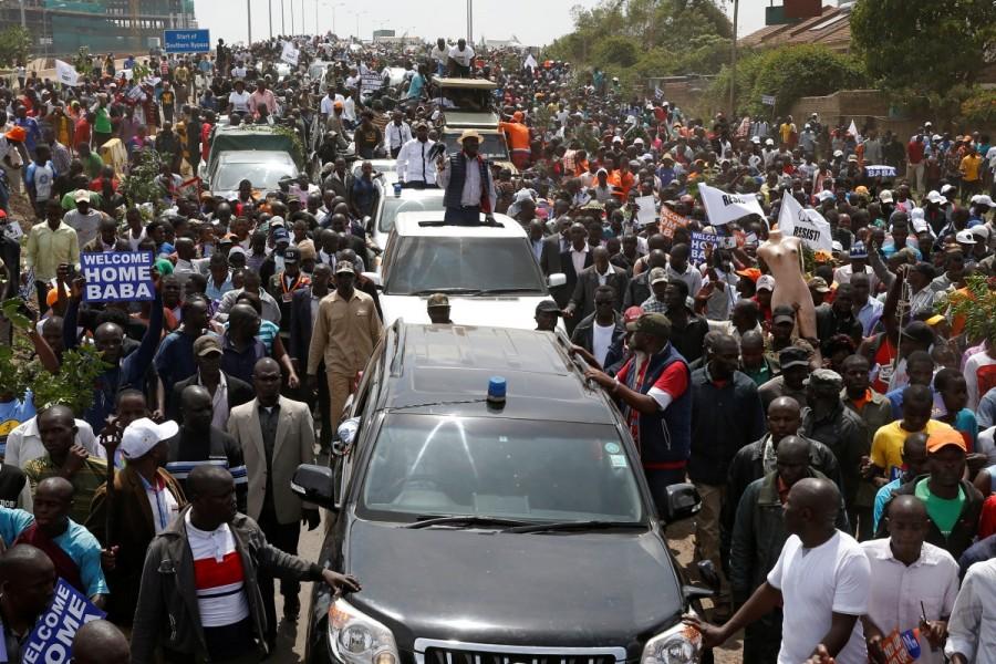 Kenyan opposition leader Raila Odinga of the National Super Alliance (NASA) coalition is welcomed by his supporters upon his return in Nairobi. Kenya,Kenya as violence,Kenyan opposition leader returns,Raila Odinga,Raila Odinga return
