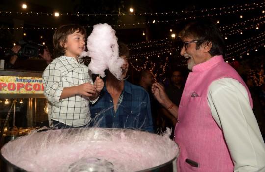 Bollywood actor Amitabh Bachchan and Shah Rukh Khan get cotton candy for AbRam on Aaradhya birthday bash.