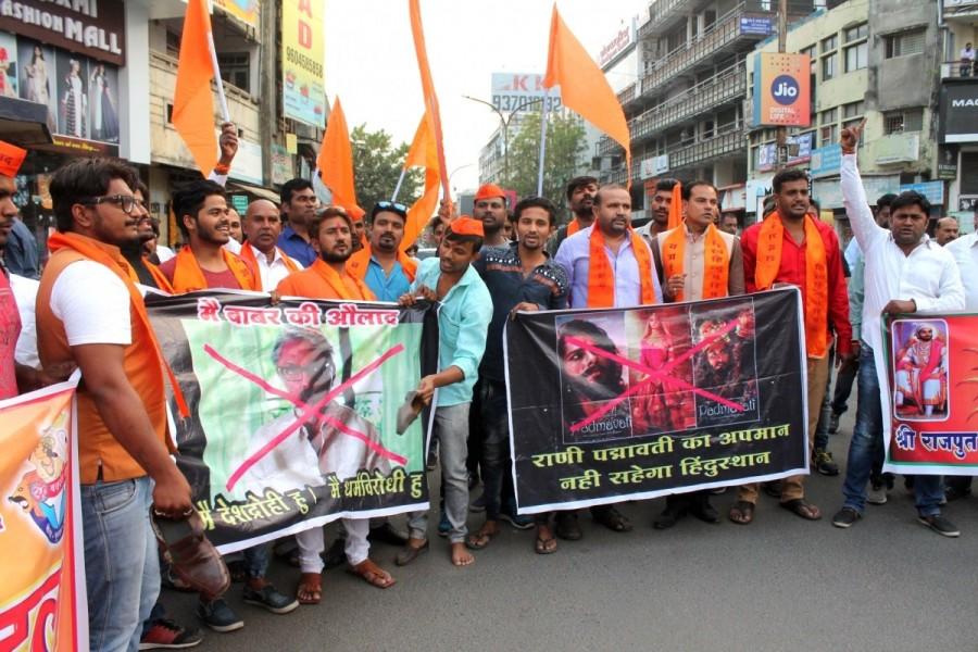 A Karni Sena leader on Thursday threatened actress Deepika Padukone, who plays the lead in the movie, with physical harm over her "provocative statements". Padmavati controversy,Deepika Padukone Padmavati controversy,Padmavati movie controversy,Sanjay Leela Bhansali,Deepika Padukone