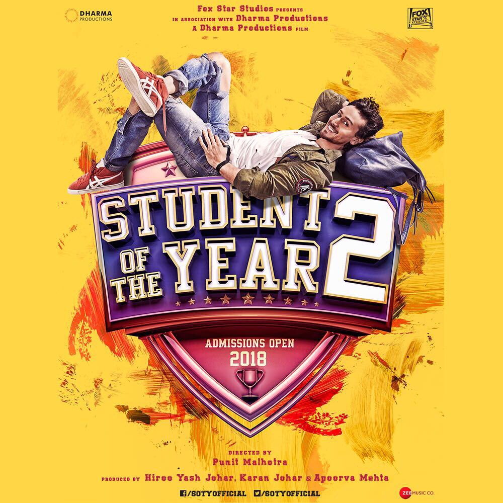 Filmmaker Karan Johar and actor Tiger Shroff on Monday released the first look of their upcoming film "Student of the Year 2". In the first look, Tiger can be seen wearing a green jacket, white T-shirt and denims, as he flaunts a smile to the camera. "Thank you Karan Johar sir and Punit Malhotra sir for giving me admission into the coolest school ever! ‘Student Of The Year 2'. In it to win it," Tiger tweeted. Karan also shared the same image and wrote: "The franchise continues! The college opens its doors to a new student! Tiger Shroff. ‘Student Of The Year 2', directed by Punit Malhotra." Student of the Year 2,Student of the Year 2 first look,Student of the Year 2 poster,Karan Johar and actor Tiger Shroff,Karan Johar,Tiger Shroff,coolest school ever,Student of the Year 2 movie poster