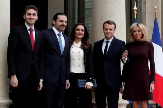 French President Emmanuel Macron and his wife Brigitte Macron, Saad al-Hariri, who announced his resignation as Lebanon's prime minister while on a visit to Saudi Arabia, his wife Lara and their son Houssam are pictured at the Elysee Palace in Paris, France, November 18, 2017.