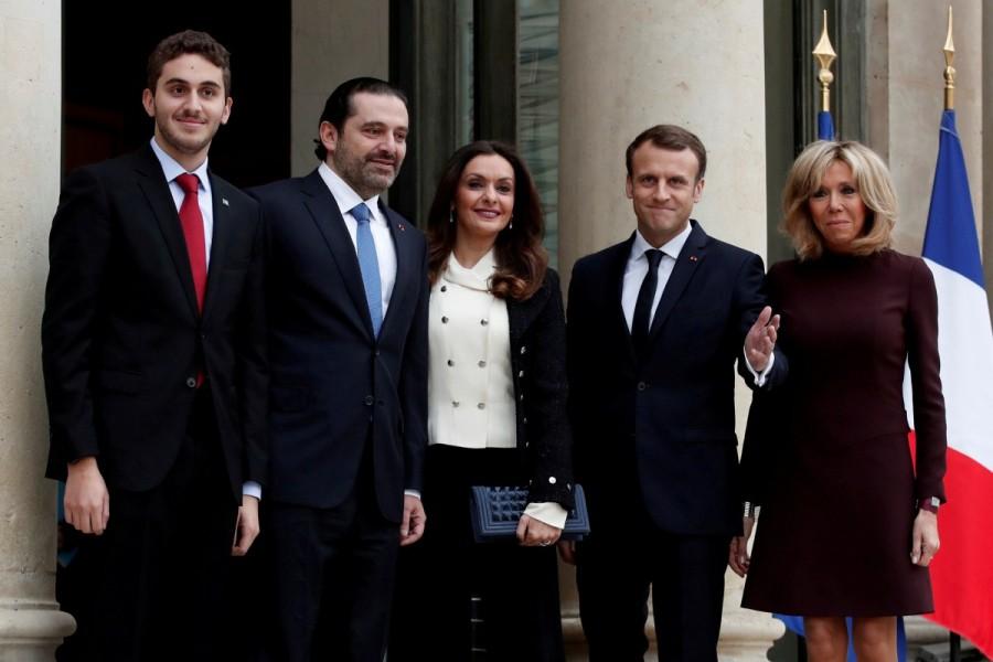 French President Emmanuel Macron and his wife Brigitte Macron, Saad al-Hariri, who announced his resignation as Lebanon's prime minister while on a visit to Saudi Arabia, his wife Lara and their son Houssam are pictured at the Elysee Palace in Paris, France, November 18, 2017. Saad al-Hariri,Lebanon’s Prime Minister Saad al-Hariri,PM Saad al-Hariri,Emmanuel Macron,President Emmanuel Macron,Lebanon
