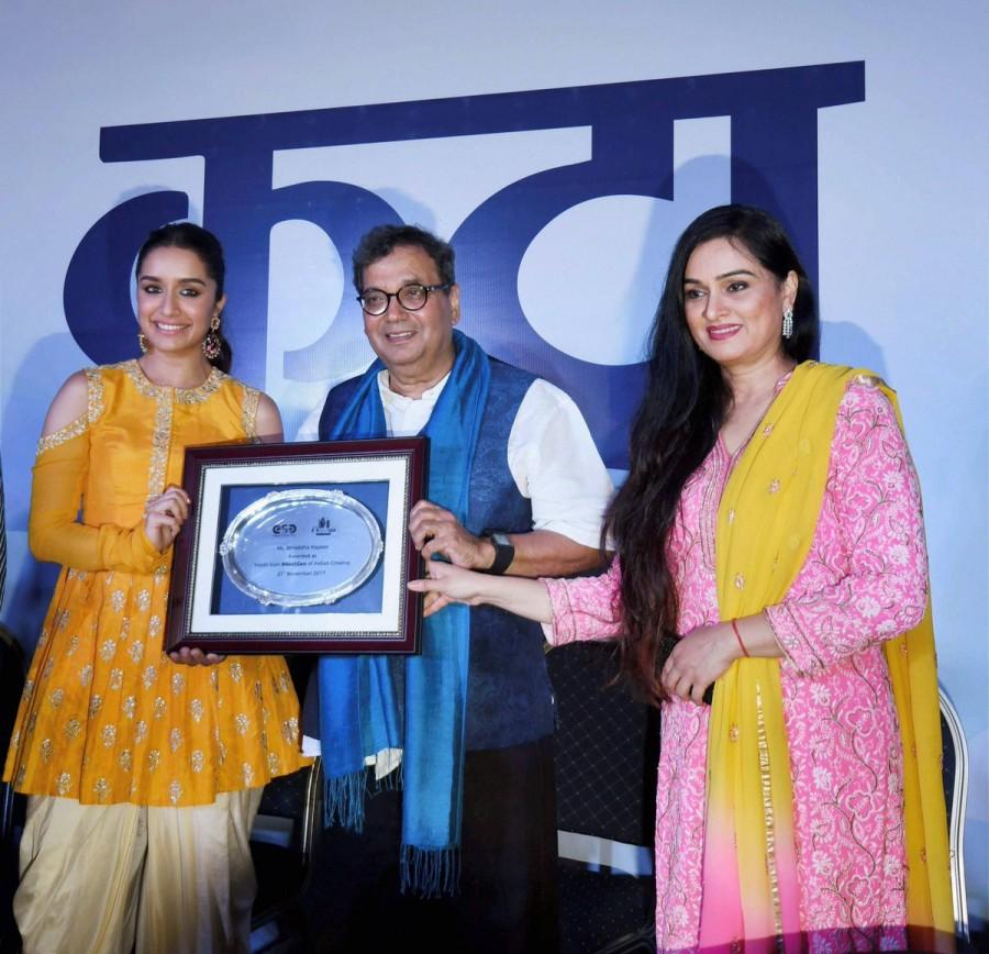 Actress Shraddha Kapoor on Tuesday was felicitated with Youth Icon of NextGen of Indian Cinema accolade at the 48th International Film Festival of India (IFFI) here. Ace filmmaker Subhash Ghai gave away the honour to the actress, who joined the movie mela to inaugurate Bioscope Village -- a part of ongoing IFFI. Shraddha Kapoor,Shraddha Kapoor gets Youth Icon tag,actress Shraddha Kapoor,Youth Icon of NextGen,IFFI 2017,IFFI,Shraddha Kapoor at IFFI