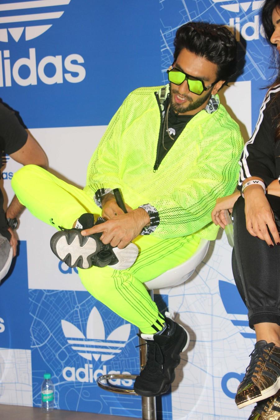 Bollywood actor Ranveer Singh at Adidas store launch in Mumbai. Ranveer Singh,actor Ranveer Singh,Ranveer Singh in Neon Dress,Ranveer Singh Neon Dress,Ranveer Singh at Adidas store launch,Adidas store launch,Adidas store launch pics,Adidas store launch images,Adidas store launch stills,Adidas store launch pictures,Adi