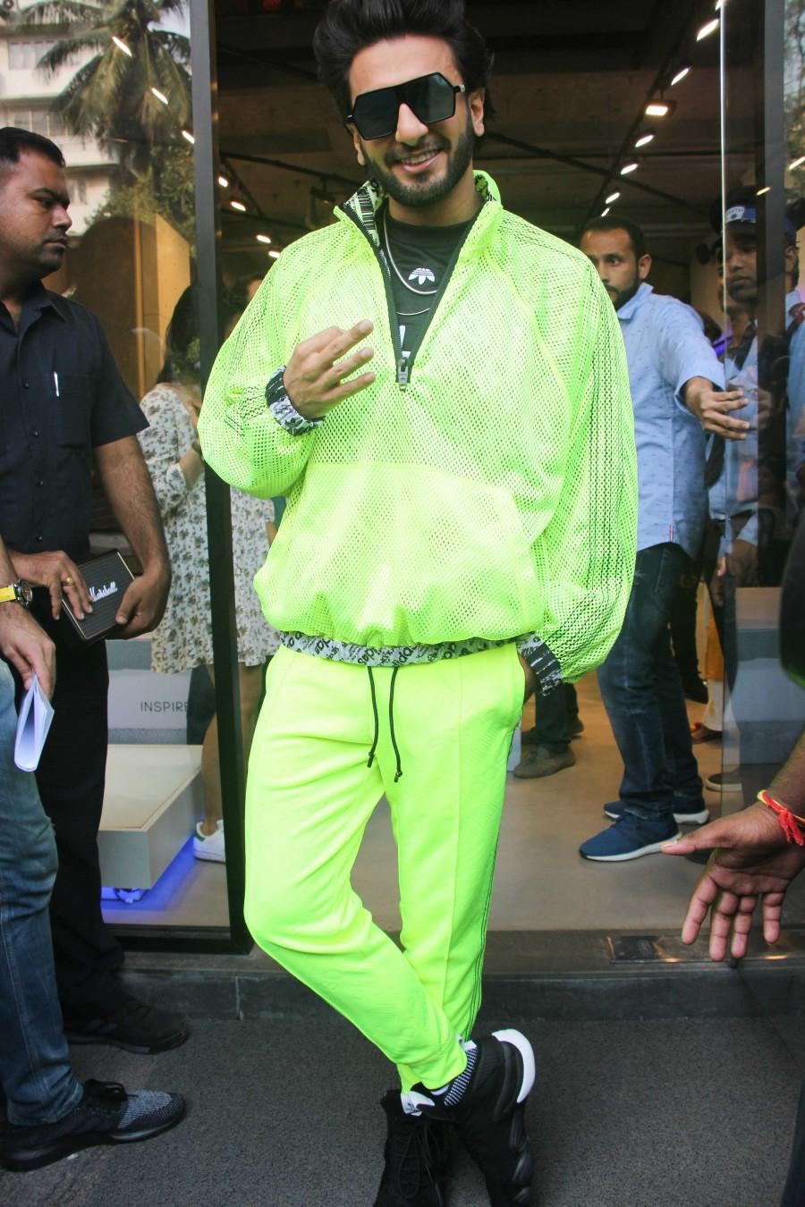 Ranveer Singh wowed all by stepping in a neon dress at the new store launch of Adidas in Mumbai. Ranveer Singh,actor Ranveer Singh,Ranveer Singh in Neon Dress,Ranveer Singh Neon Dress,Ranveer Singh at Adidas store launch,Adidas store launch,Adidas store launch pics,Adidas store launch images,Adidas store launch stills,Adidas store launch pictures,Adi