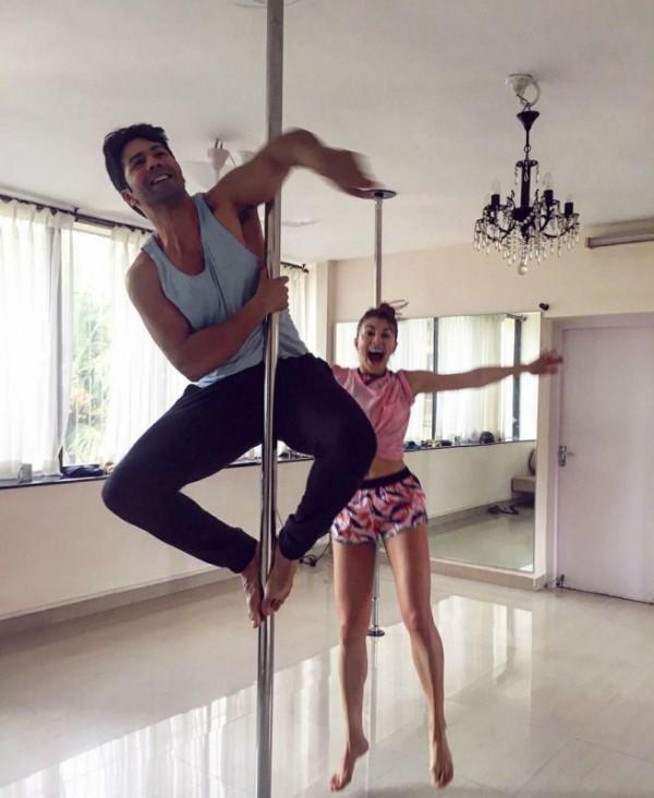 Jacqueline Fernandez guides Varun Dhawan on pole dancing 