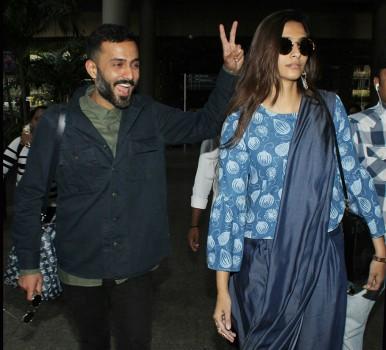 Sonam Kapoor and Anand Ahuja return from Singapore.