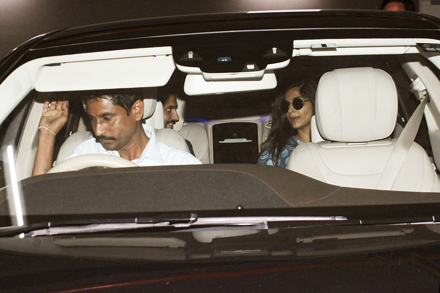 Sonam Kapoor and Anand Ahuja leaving together in a car at Mumbai airport. Sonam Kapoor,actress Sonam Kapoor,Sonam Kapoor boyfriend,sonam kapoor boyfriend anand ahuja,Anand Ahuja,Sonam Kapoor spotted at airport,Sonam Kapoor at airport