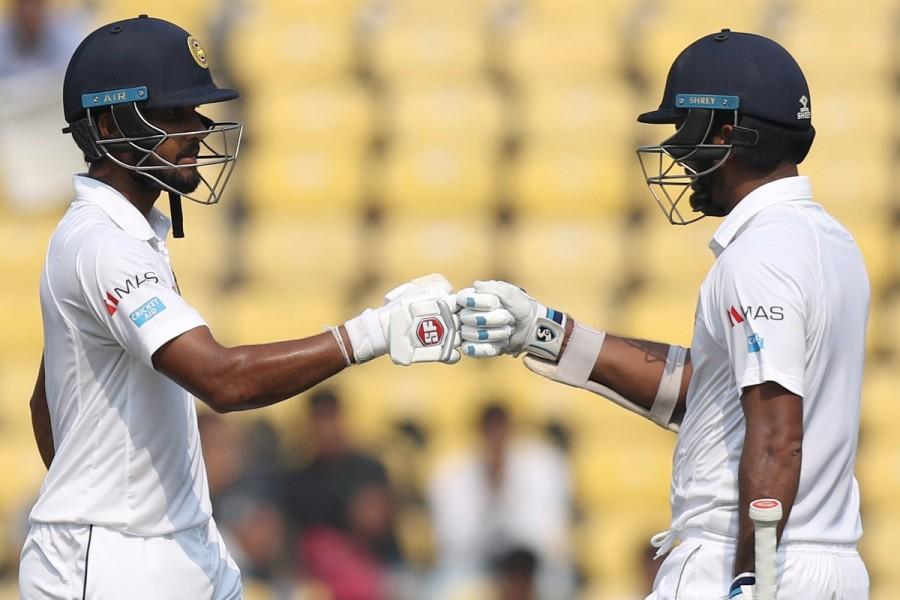 Brief Scores: Sri Lanka 151/4 (Dimukh Karunaratne 51, Dinesh Chandimal 47 not out, Niroshan Dickwella 18 not out; Ishant Sharma 2/33). India vs Sri Lanka,India vs Sri Lanka 2017,India vs Sri Lanka 2nd Test,India vs Sri Lanka score,India vs Sri Lanka live,Chandimal,Dinesh Chandimal