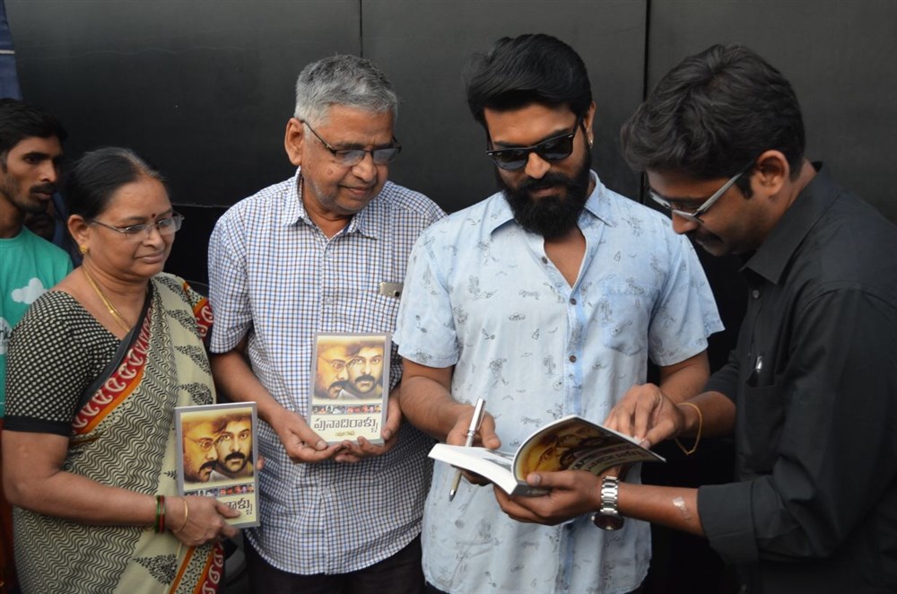 Ram Charan releases Punadirallu book written on Chiranjeevi. Megastar Chiranjeevi,Chiranjeevi,Chiranjeevi book,Ram Charan,Ram Charan teja,Punadirallu,Punadirallu book,Ram Charan releases Punadirallu book