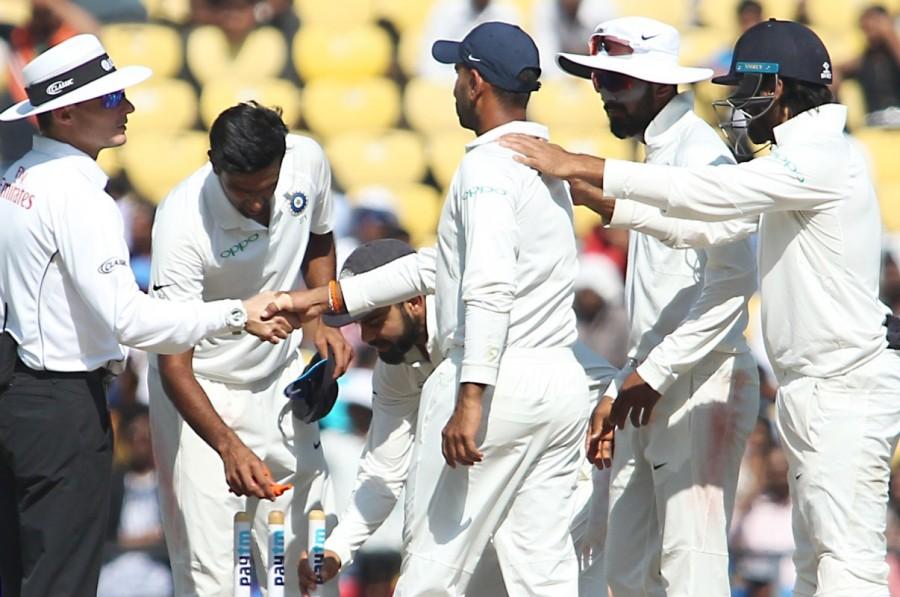 Beginning the day 384 behind with nine wickets in hand and needing to bat about five sessions to save the Test, Sri Lanka failed to step up to the pressure and folded up inside the tea session on the fourth day at the Vidarbha Cricket Association Stadium. Captain Dinesh Chandimal (61) waged a lone battle as shared a 58-run stand for the eight wicket with Suranga Lakmal (31) to delay the inevitable. Indian bowlers hunted in packs, with all of them getting into wickets column. Off-spinner Ravichandran Ashwin (4/63), left-arm spinner Ravindra Jadeja (2/28), pacers Umesh Yadav (2/30) and Ishant Sharma (2/43) were all over the Sri Lankan batsmen. India beat Sri Lanka,India beat Sri Lanka in second Test,India trash Sri Lanka,India beat Sri Lanka by 239 runs,India beat Sri Lanka by an innings,Virat Kohli,Ravichandran Ashwin