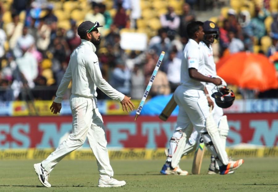 Brief scores: Sri Lanka: 205 all out and 166 all out (Dinesh Chandimal 61, Suranga Lakmal 31; Ravichandran Ashwin 4/63, Ravindra Jadeja 2/28, Umesh Yadav 2/30, Ishant Sharma 2/43) vs India: 610/6 declared. India beat Sri Lanka,India beat Sri Lanka in second Test,India trash Sri Lanka,India beat Sri Lanka by 239 runs,India beat Sri Lanka by an innings,Virat Kohli,Ravichandran Ashwin