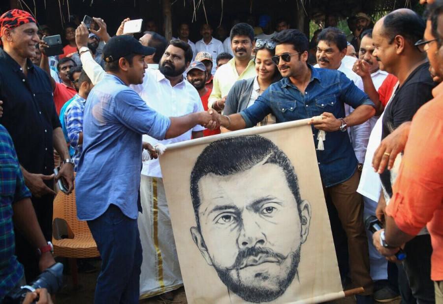 South Indian actor Suriya and Jyothika launch first look of Nivin Pauly's Kayamkulam Kochunni. Suriya and Jyothika,Suriya,Jyothika,Nivin Pauly,Kayamkulam Kochunni,Kayamkulam Kochunni first look,Kayamkulam Kochunni poster,amala paul kayamkulam kochunni',nivin pauly kayamkulam kochunni,Rosshan Andrrews