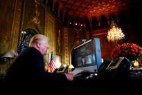 President Donald Trump speaks via video teleconference with troops from Mar-a-Lago estate in Palm Beach, Florida, November 23, 2017.
