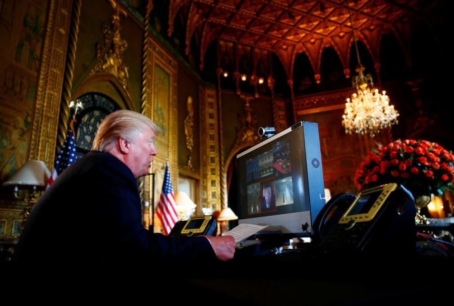 President Donald Trump speaks via video teleconference with troops from Mar-a-Lago estate in Palm Beach, Florida, November 23, 2017. Donald Trump,President Donald Trump,Thanksgiving,Donald Trump Thanksgiving,Mar-a-Lago estate