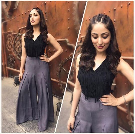 Perfect hairdo to compliment: She looks amazingly beautiful in a black sleeveless tassel top paired with a pair of smoky-grey palazzos. The best part of her look is her braided hairstyle. Yami Gautam,actress Yami Gautam,Yami Gautam fashion,Yami Gautam amazing fashion,Yami Gautam dress,Yami Gautam hot pics,Yami Gautam hot images,Yami Gautam hot stills,Yami Gautam hot pictures,Yami Gautam hot photos
