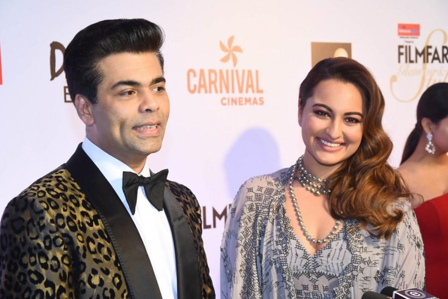Karan Johar and Sonakshi Sinha poses for the cameras at the Red carpet at the Reliance Digital and Filmfare Glamour and Style Awards 2017 held in Mumbai on December 01, 2017. Harshvardhan Kapoor,Sonam Kapoor,Karan Johar,Sonakshi Sinha,Huma Qureshi,Filmfare Glamour & Style Awards 2017,Filmfare Glamour & Style Awards,celebs at Filmfare Glamour & Style Awards 2017
