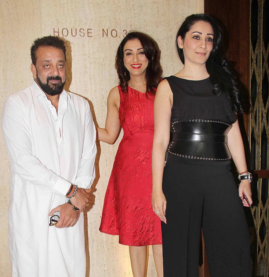 Madhurima Nigam pose with Sanjay and Manyata Dutt during Manish Malhotra's Get-Together Party.. Sanjay Dutt,Sophie Choudry,Raveena Tandon,Manish Malhotra's Get-Together Party,Manish Malhotra,celebs at Manish Malhotra's Get-Together Party,Manish Malhotra's Get-Together Party pics,Manish Malhotra's Get-Together Party images,Manish