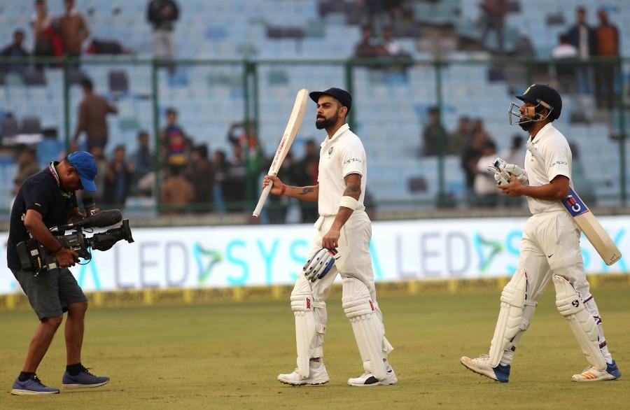 Kohli, playing in his 63rd Test, took 238 deliveries to complete his second consecutive double hundred as he continued to plunder the Sri Lankans in the morning session of the match at the Ferozshah Kotla stadium. Virat Kohli,Virat Kohli record,Virat Kohli record double centuries,Virat Kohli double centuries,Sachin Tendulkar,Virender Sehwag