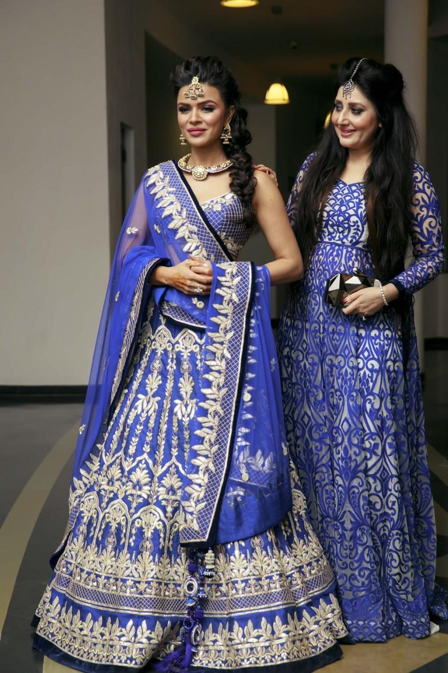 Aashka Goradia looked ethereal in a blue Archana Kochhar lehenga and Brent carried off an Indo western velvet outfit by the same designer with a lot of panache. Aashka had chosen traditional jewelery from ORRA to match the beautiful blue lehenga! The Taj necklace which Aashka wore has been inspired from the intricate inlay work done on white marble on one of the wonders of the world, the Taj Mahal. Aashka Goradia and Brent Goble,Aashka Goradia,Brent Goble,Aashka Goradia and Brent Goble sangeet ceremony,Aashka Goradia and Brent Goble sangeet ceremony pics,Aashka Goradia and Brent Goble sangeet ceremony images,Aashka Goradia and Brent Goble sangeet ce