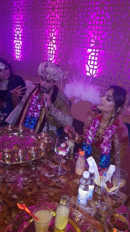 The newly wed couple Abhishek Bajaj and Akanksha Jindal chilling on hukka. Abhishek Bajaj and Akanksha Jindal,Abhishek Bajaj,Akanksha Jindal,Abhishek Bajaj's wedding pictures,Abhishek Bajaj wedding pics,Abhishek Bajaj wedding images,Abhishek Bajaj wedding stills,Abhishek Bajaj wedding pictures,Abhishek Bajaj wedding photos