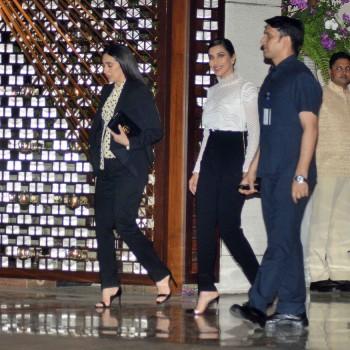 Alia Bhatt and Katrina Kaif pose together as they arrive at Mukesh Ambani's party in Mumbai.