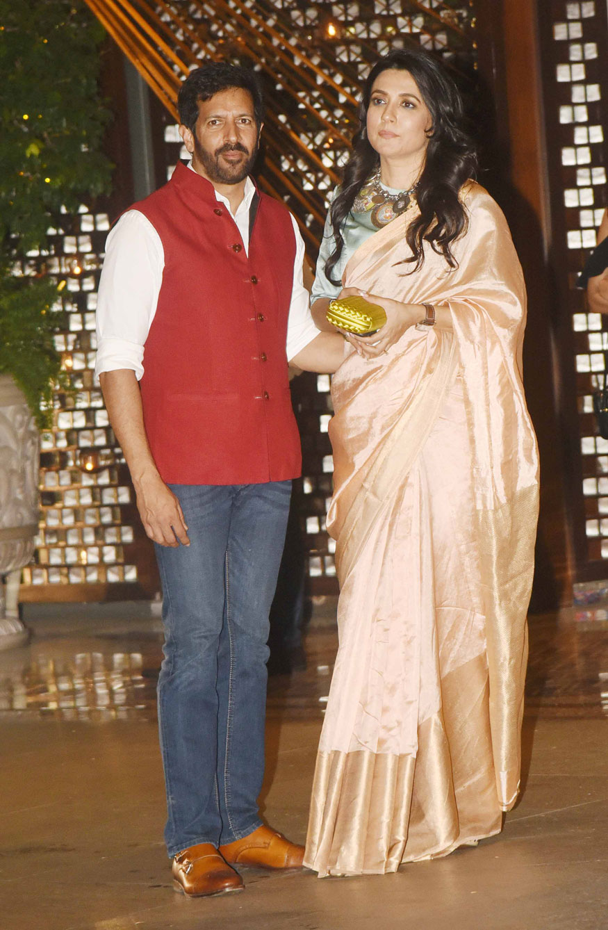 Kabir Khan with his wife Mini Mathur pose together as they arrive at Mukesh Ambani's party in Mumbai. Amitabh Bachchan,Shah Rukh Khan,Sachin Tendulkar,Karan Johar,Mukesh Ambani Party,Mukesh Ambani Party pics,Mukesh Ambani Party images,Mukesh Ambani Party stills,Mukesh Ambani Party pictures,Mukesh Ambani Party photos