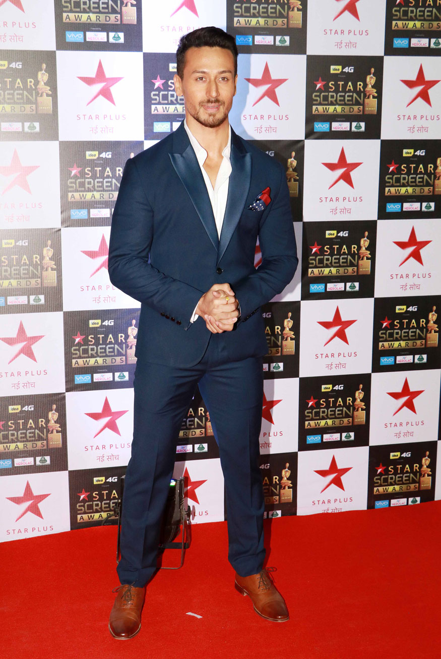 Tiger Shroff poses for the photographers during the Star Screen Awards at Bandra Kurla Complex in Mumbai. Salman Khan,Irrfan Khan,Arjun Rampal,Tiger Shroff,Varun Dhawan,Harshvardhan Kapoor,Star Screen Awards 2017,Star Screen Awards,Celebs at Star Screen Awards 2017,Star Screen Awards pics,Star Screen Awards images,Star Screen Awards stills,Star Screen Awards
