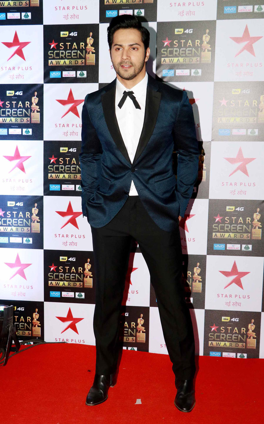 Varun Dhawan poses for the photographers during the Star Screen Awards at Bandra Kurla Complex in Mumbai. Salman Khan,Irrfan Khan,Arjun Rampal,Tiger Shroff,Varun Dhawan,Harshvardhan Kapoor,Star Screen Awards 2017,Star Screen Awards,Celebs at Star Screen Awards 2017,Star Screen Awards pics,Star Screen Awards images,Star Screen Awards stills,Star Screen Awards