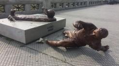 Photos on Sunday posted on social media showed the sculpture lying on its side on the pavement, having been chopped off at its ankles, reports Xinhua news agency. Police said they had no information about the identity of the perpetrators.