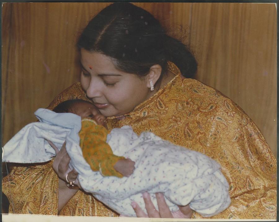 J Jayalalithaa with an infant in Chennai on 19 May 1995. Jayalalithaa,Jayalalitha,Jayalalithaa 1st Death Anniversary,Jayalalithaa Death Anniversary,Jayalalithaa rare pics,Jayalalithaa rare images,Jayalalithaa rare stills,Jayalalithaa rare pictures,Jayalalithaa rare photos,Jayalalithaa unseen pics,Jayalalithaa u
