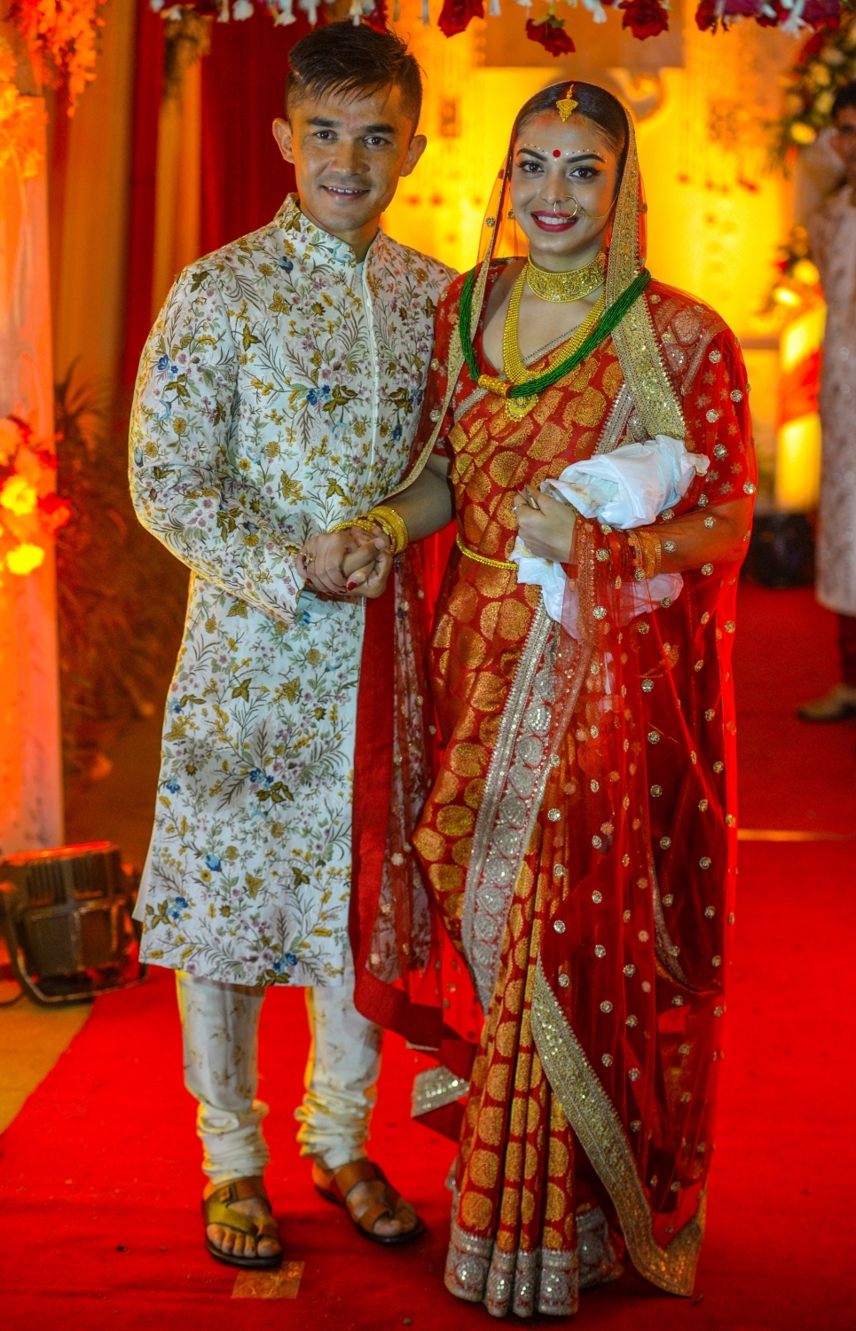 Sonam, on the other hand, was resplendent in a red and golden saree, and was seen smiling throughout the wedding ceremony. West Bengal Chief Minister Mamata Banerjee, several other ministers, former soccer stars including Chuni Goswami, Renedy Singh, and a number of current players graced the occasion, as a large number of shutterbugs clicked frantically to capture every minute of the memorable occasion. Sunil Chhetri,Sunil Chhetri weds Sonam Bhattacharya,Sonam Bhattacharya,Sunil Chhetri wedding pics,Sunil Chhetri wedding images,Sunil Chhetri wedding stills,Sunil Chhetri wedding pictures,Sunil Chhetri wedding photos