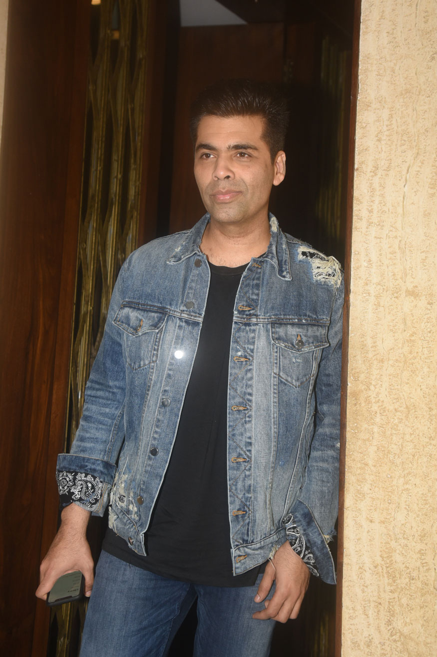Karan Johar poses for photographers during Manish Malhotra's birthday party. Aditi Rao Hydari,Anil Thadani,Raveena Tandon,Huma Qureshi,Karan Johar,Sonakshi Sinha,Sophie Choudry,Manish Malhotra's Birthday Bash,Manish Malhotra Birthday Bash,celebs at Manish Malhotra Birthday Bash